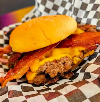 Mattito’s cheeseburger on black and white checkered paper